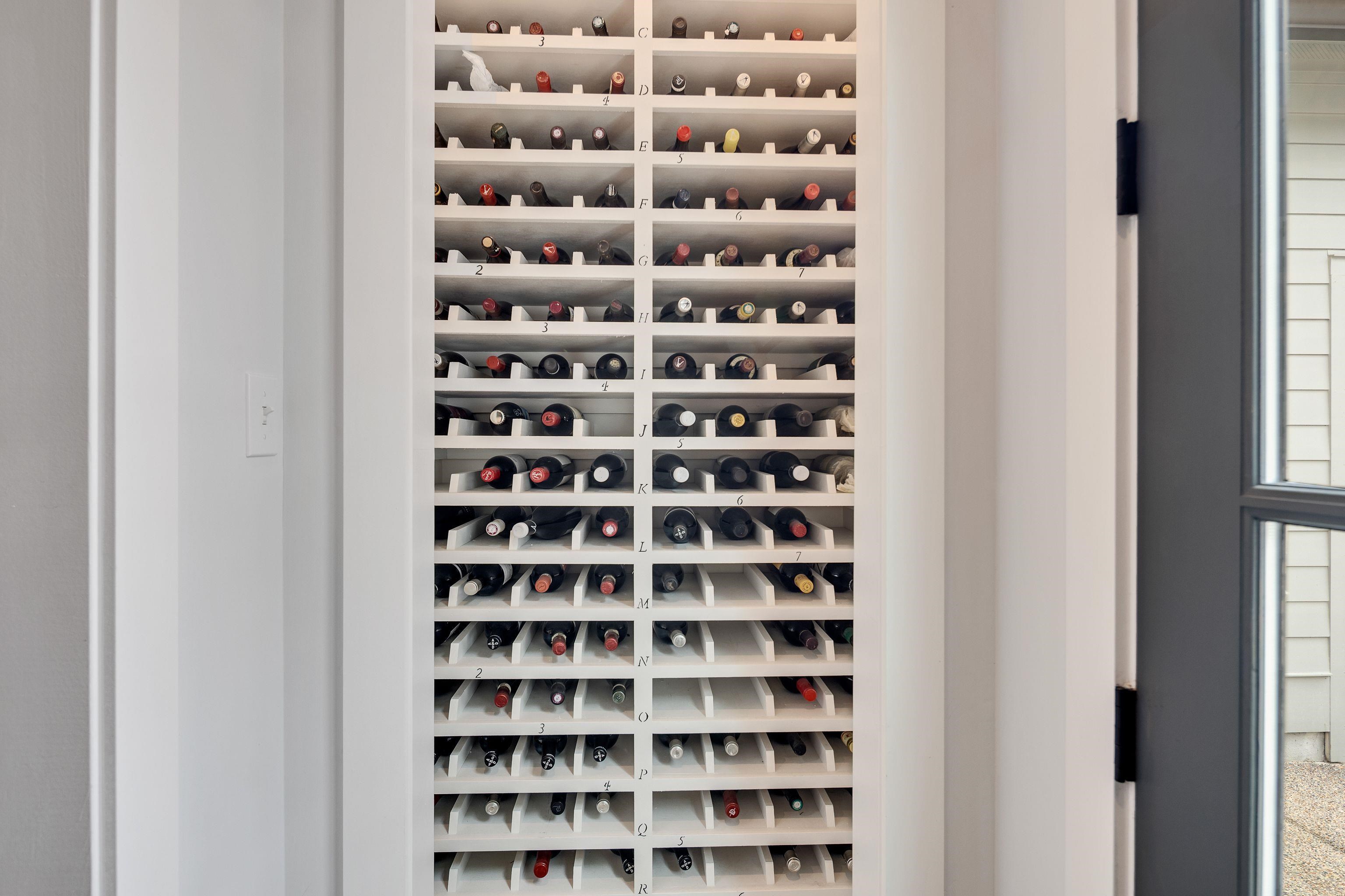 1133 Hayne Road Memphis, TN 38119 - Photo 16 of 34 Custom built in wine rack in butlers' area off of kitchen