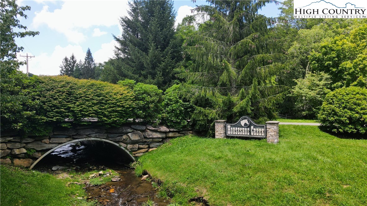 Lot 1 Horseshoe Creek Road Banner Elk, NC 28604 - Photo 8 of 20 a view of a chairs in a backyard