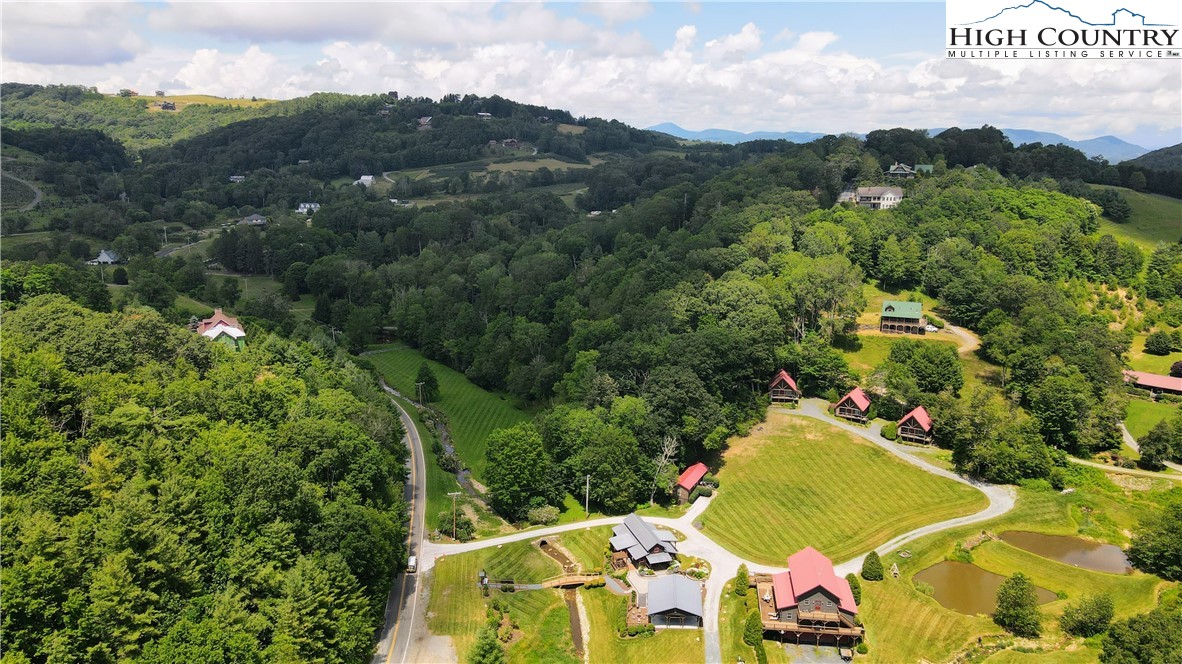 Lot 1 Horseshoe Creek Road Banner Elk, NC 28604 - Photo 10 of 20 an aerial view of a residential houses with outdoor space and trees