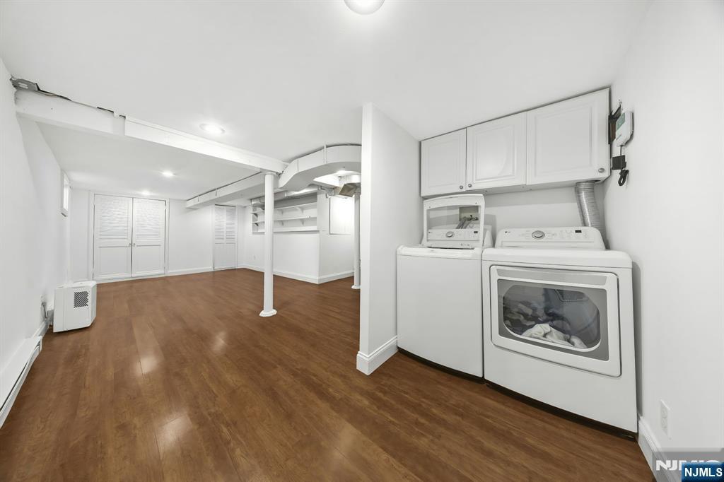 62 Sycamore Road Dumont, NJ 07628 - Photo 24 of 43 a view of a livingroom with washer and dryer