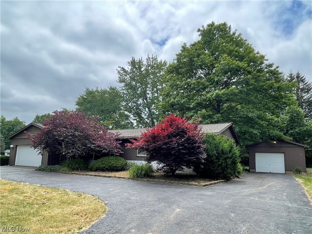 15220 Hatfield Road Rittman, OH 44270 - Photo 2 of 23 Convenient turn around drive with a view of the additional 1 car garage.