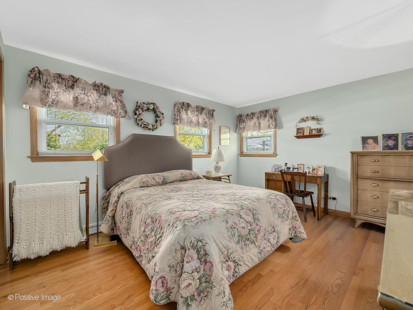 516 Eldon Place Downers Grove, IL 60516 - Photo 17 of 18 a bedroom with a bed and wooden floor