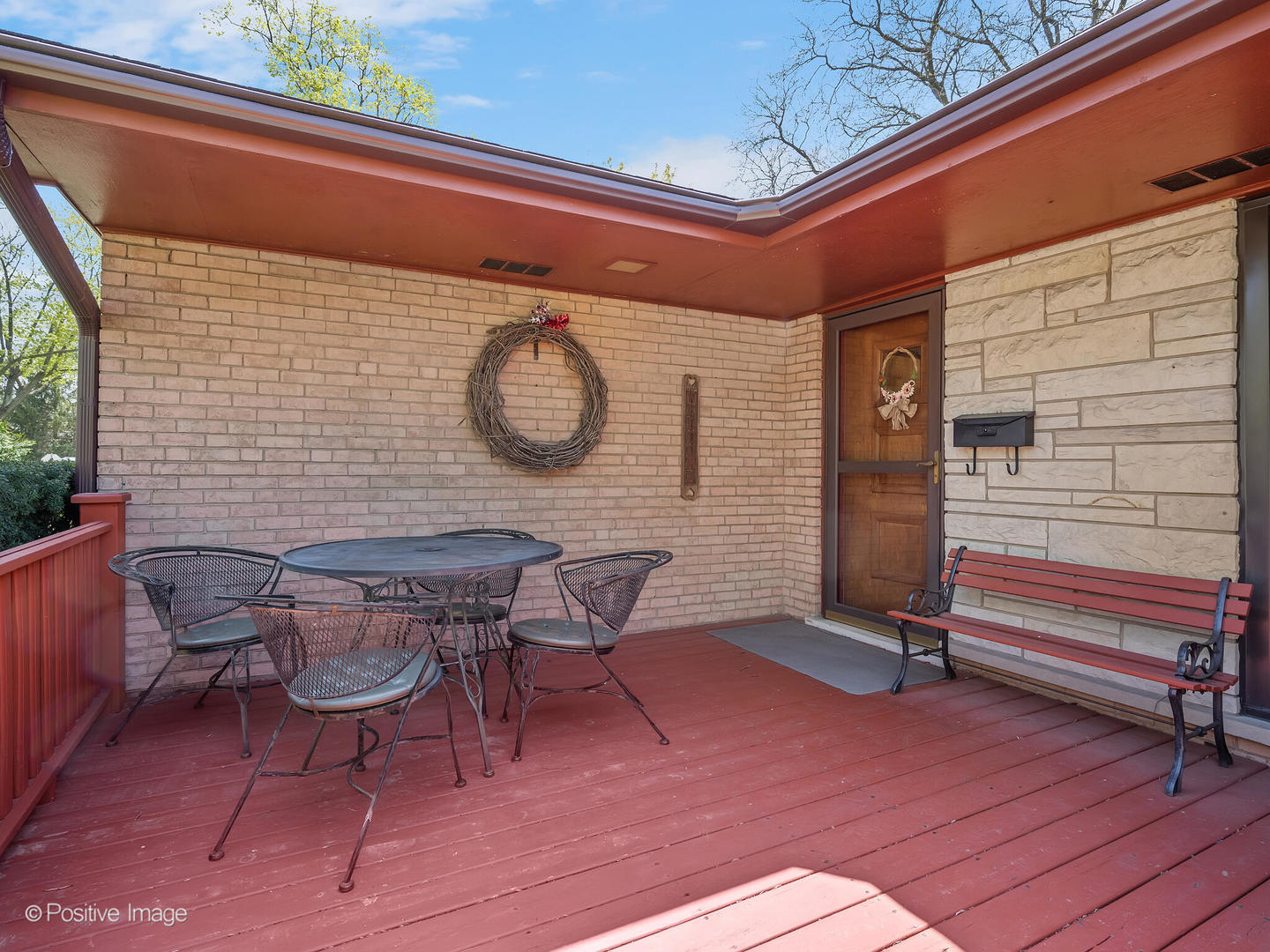 516 Eldon Place Downers Grove, IL 60516 - Photo 3 of 18 a backyard of a house with table and chairs