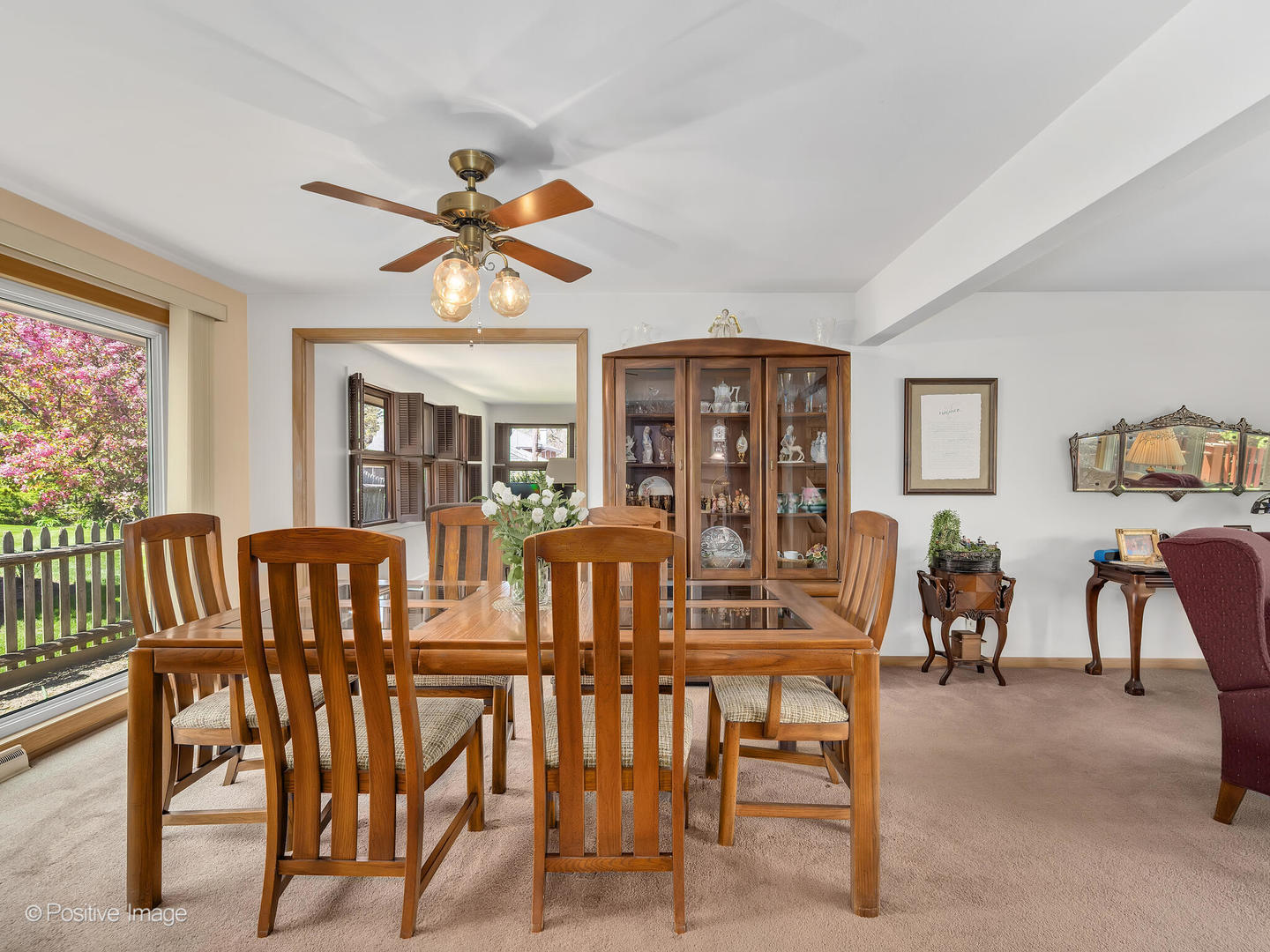 516 Eldon Place Downers Grove, IL 60516 - Photo 8 of 18 a view of a dining room with furniture window and wooden floor
