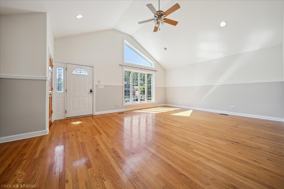 2929 North Rutherford Avenue Chicago, IL 60634 - Photo 17 of 26 wooden floor in an empty room with a window