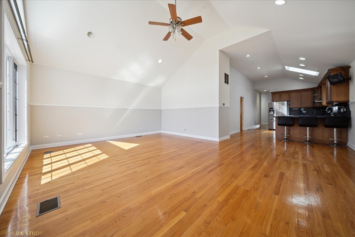 2929 North Rutherford Avenue Chicago, IL 60634 - Photo 18 of 26 a view of a workspace with wooden floor