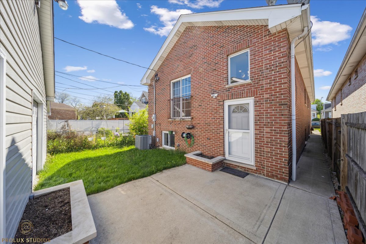 2929 North Rutherford Avenue Chicago, IL 60634 - Photo 26 of 26 a view of a house with a yard