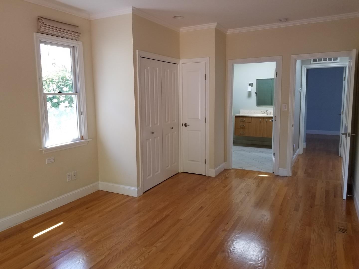 537 View Street Mountain View, CA 94041 - Photo 5 of 9 an empty room with wooden floor and windows