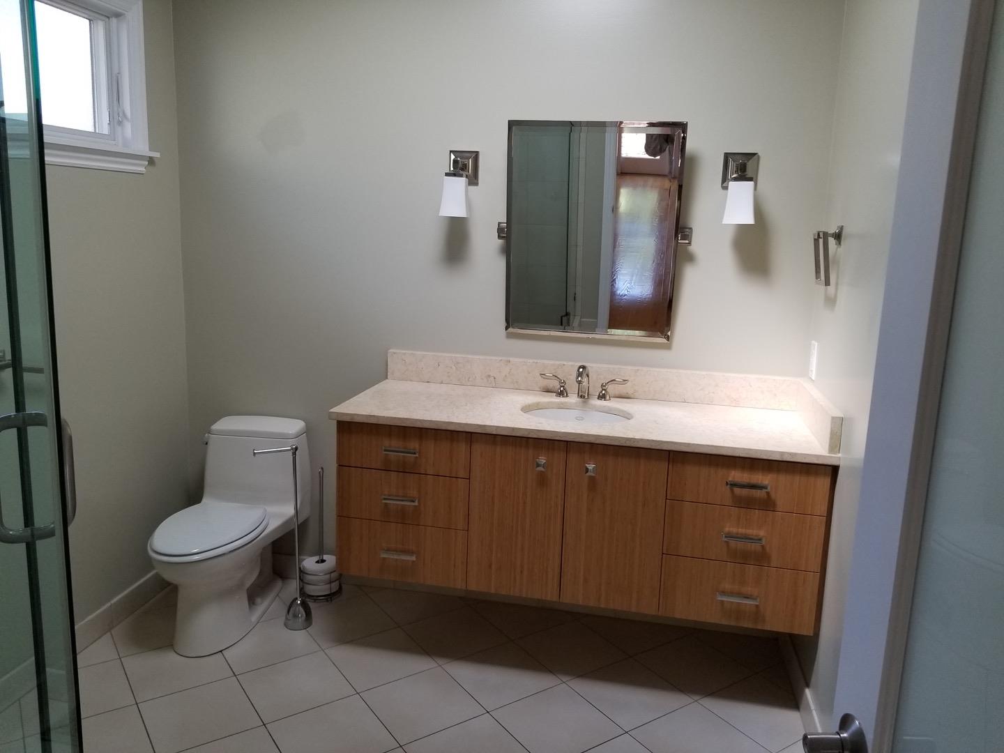 537 View Street Mountain View, CA 94041 - Photo 7 of 9 a bathroom with a toilet sink and mirror