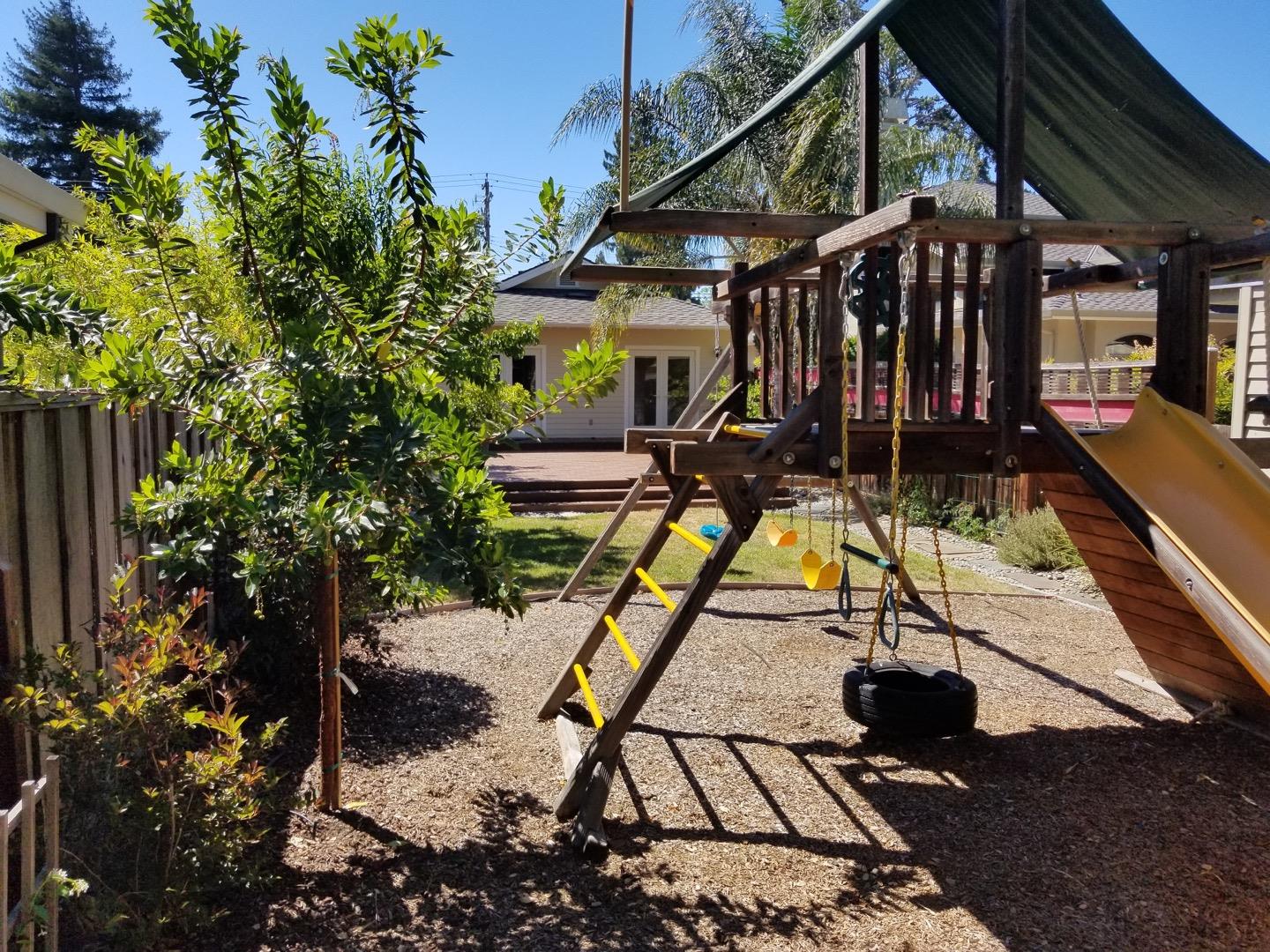 537 View Street Mountain View, CA 94041 - Photo 8 of 9 a view of a house with backyard and sitting area