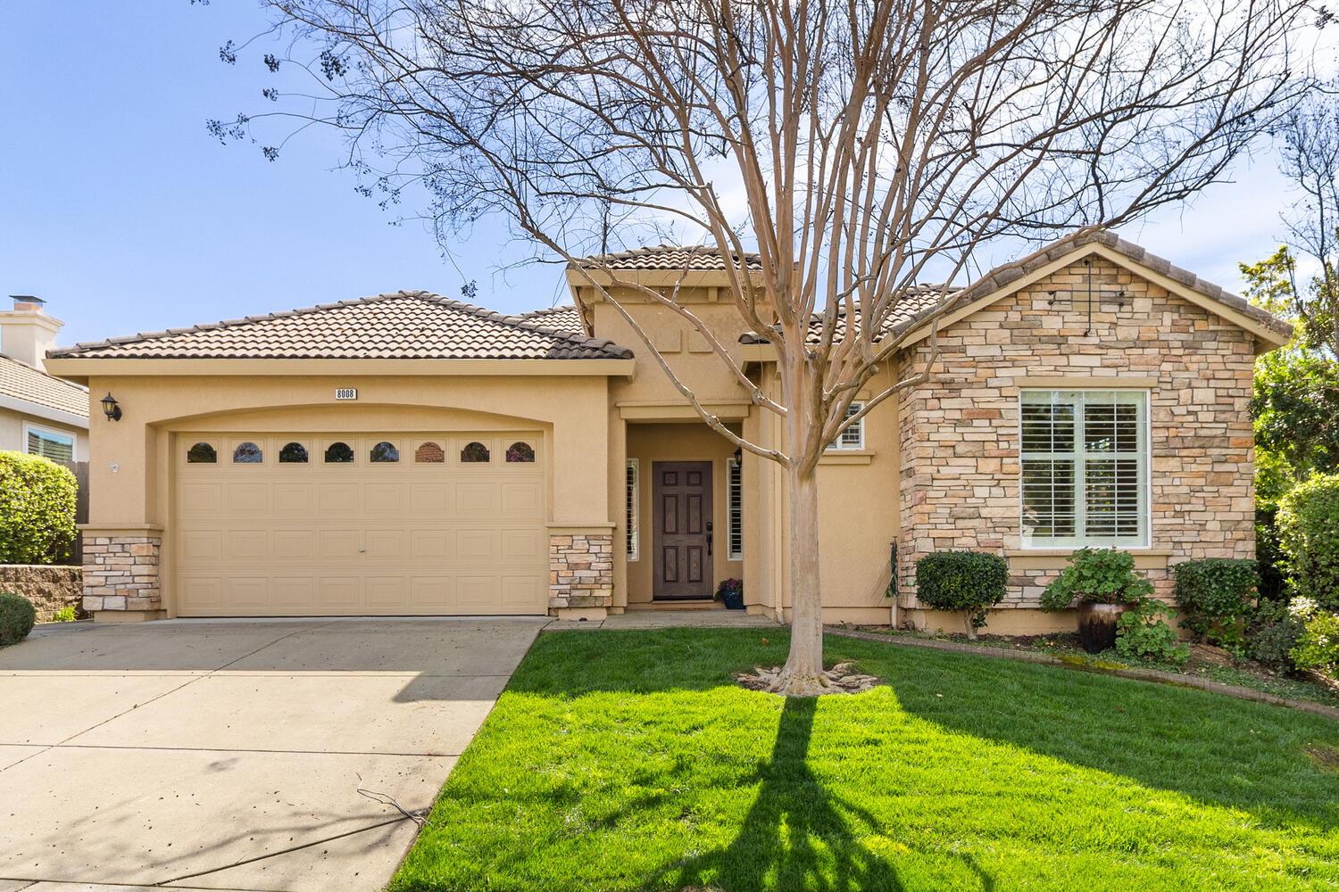 8008 Fallview Way El Dorado Hills, CA 95762 - Photo 1 of 1 a front view of a house with a yard and garage