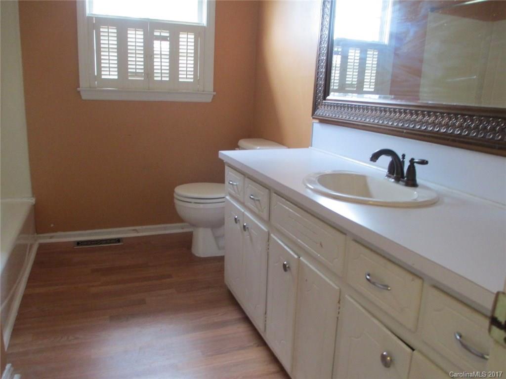 2312 Sunshine Road Lancaster, SC 29720 - Photo 16 of 16 a bathroom with a sink and a toilet