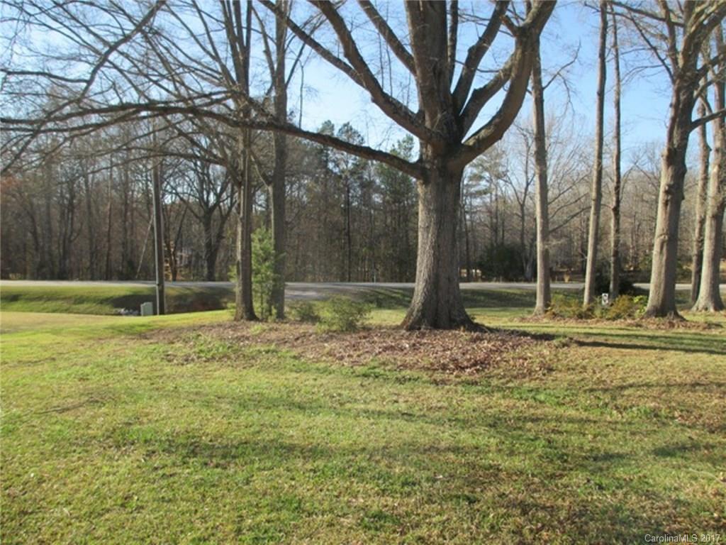 2312 Sunshine Road Lancaster, SC 29720 - Photo 3 of 16 a backyard of a house with lots of green space