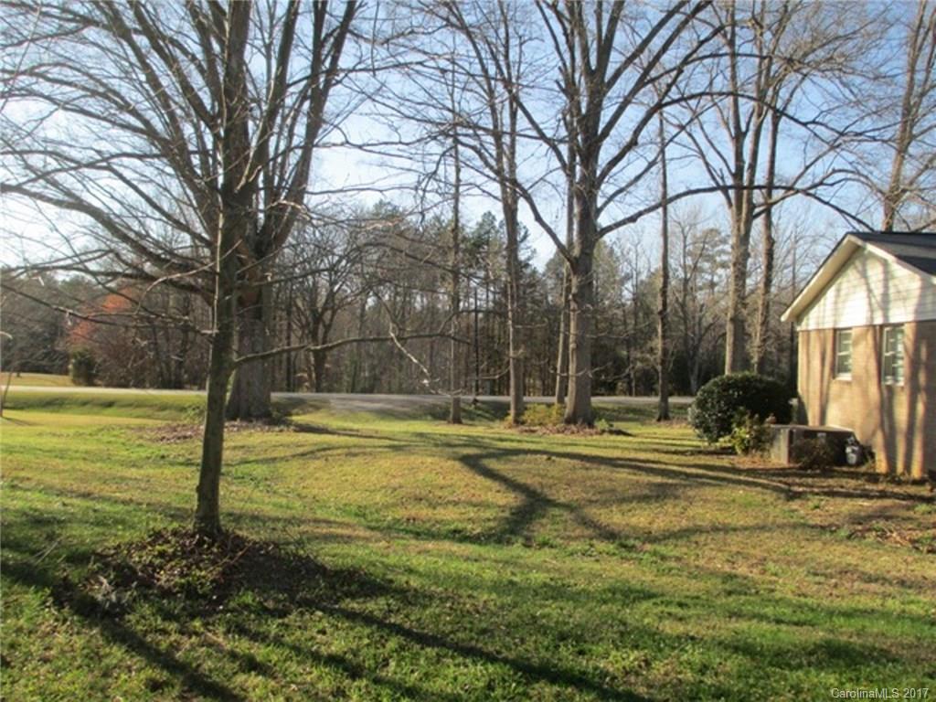 2312 Sunshine Road Lancaster, SC 29720 - Photo 4 of 16 a view of a fountain in front of a house