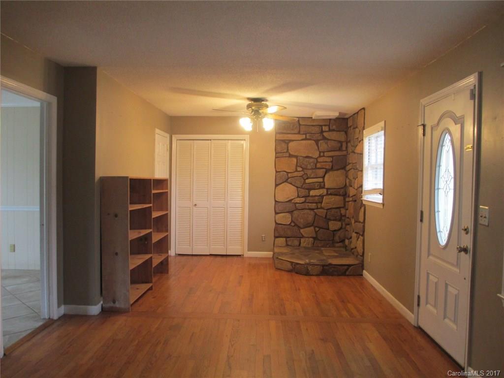 2312 Sunshine Road Lancaster, SC 29720 - Photo 7 of 16 a view of walk in closet with wooden floor