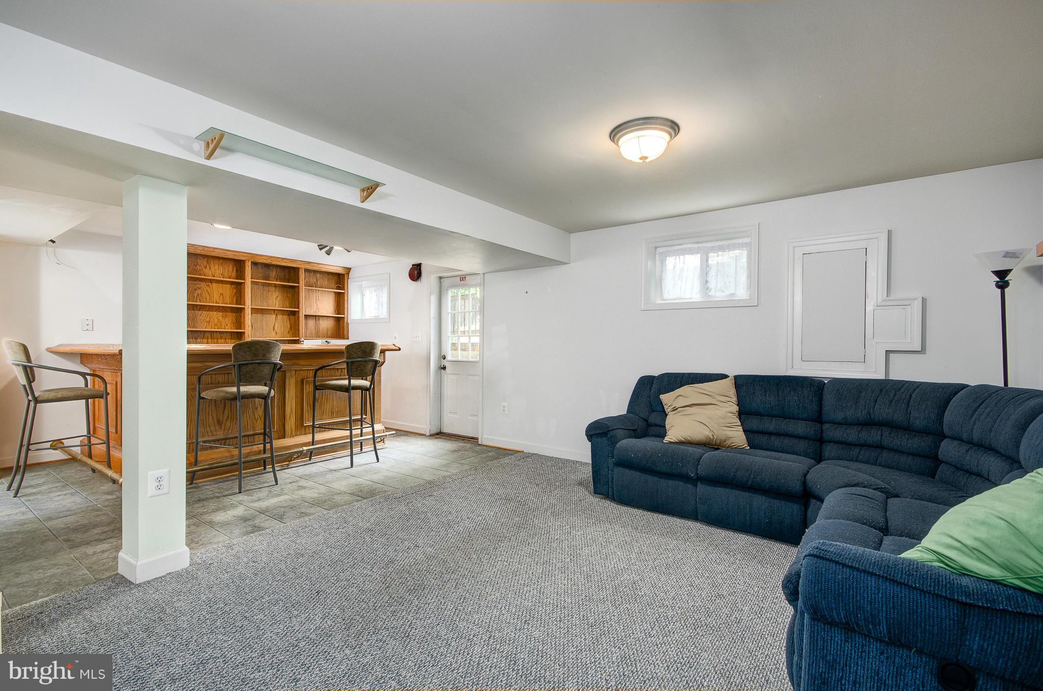 8402 Riverside Road Alexandria, VA 22308 - Photo 21 of 29 a living room with furniture and a window