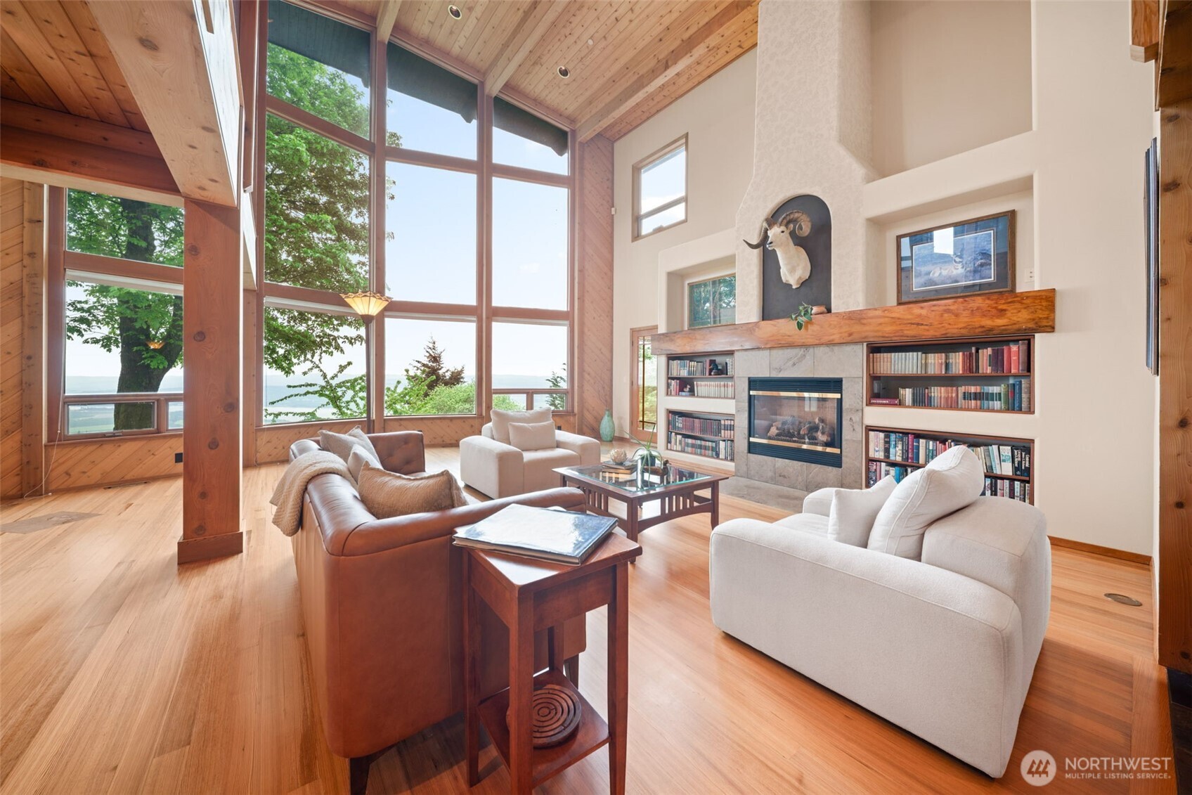813 Varsity Road Kalama, WA 98625 - Photo 6 of 40 a living room with fireplace furniture and a large window