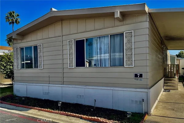 a front view of a house with a garage