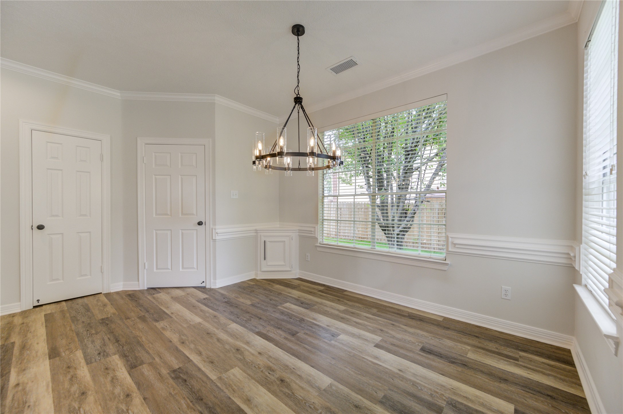 17318 Bonnard Circle Spring, TX 77379 - Photo 17 of 45 The large breakfast area features a beautiful farm style chandelier.