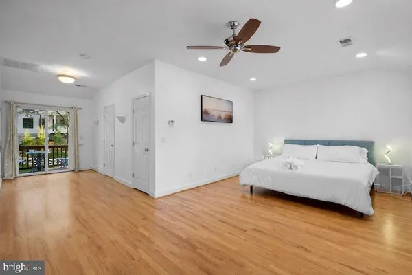 a view of a livingroom with a hardwood floor