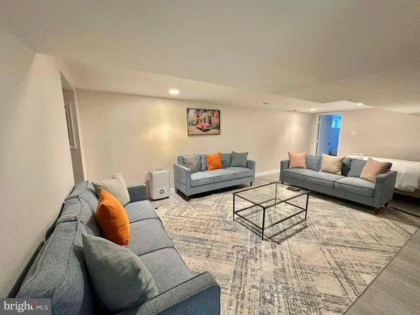 a living room with furniture and a couch