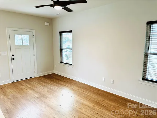 a view of an empty room and window