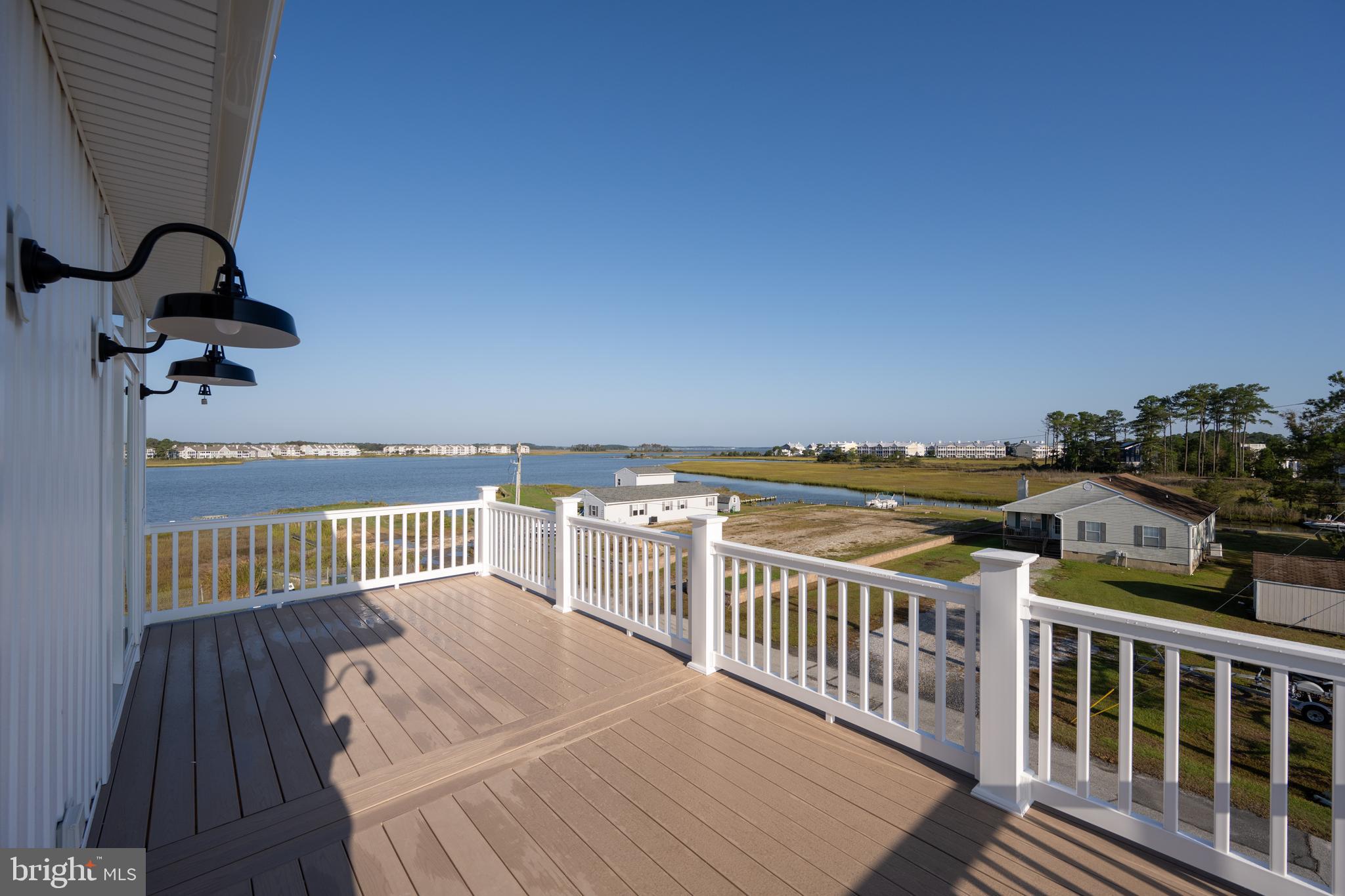 30547 Topside Court Ocean View, DE 19970 - Photo 10 of 39 a view of balcony with wooden floor