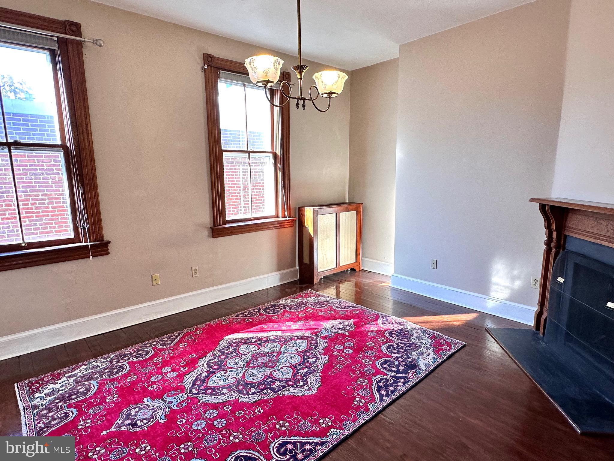 1 6th Street Northeast Washington, DC 20003 - Photo 19 of 27 Bedroom w/ Fireplace