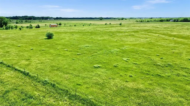 a view of a lake with a beach