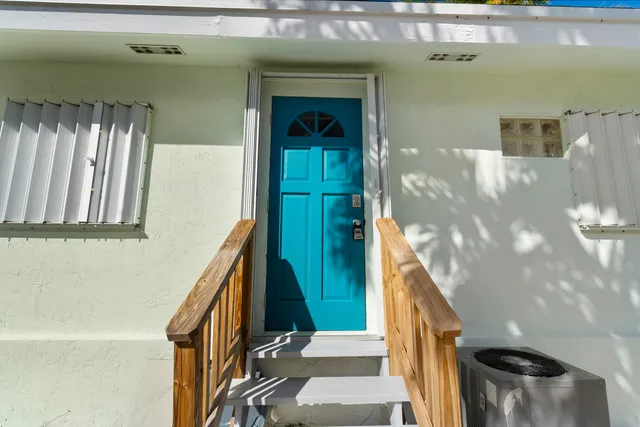 a kitchen with stainless steel appliances granite countertop a refrigerator stove top oven a sink and dishwasher