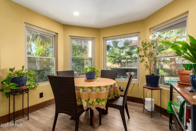 a kitchen with sink and cabinets