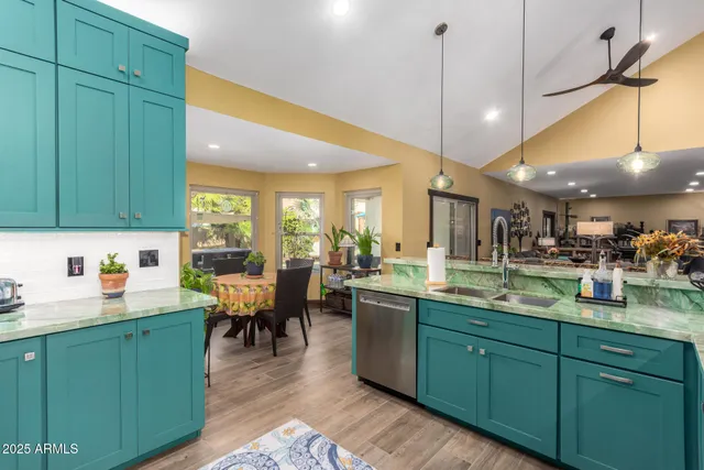 a kitchen with a sink and cabinets
