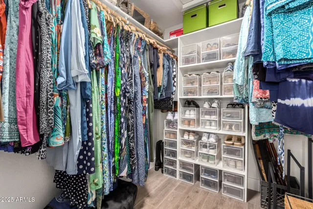 a room with lots of white walls and glass door