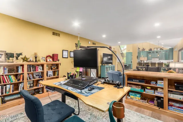 a view of a workspace with furniture