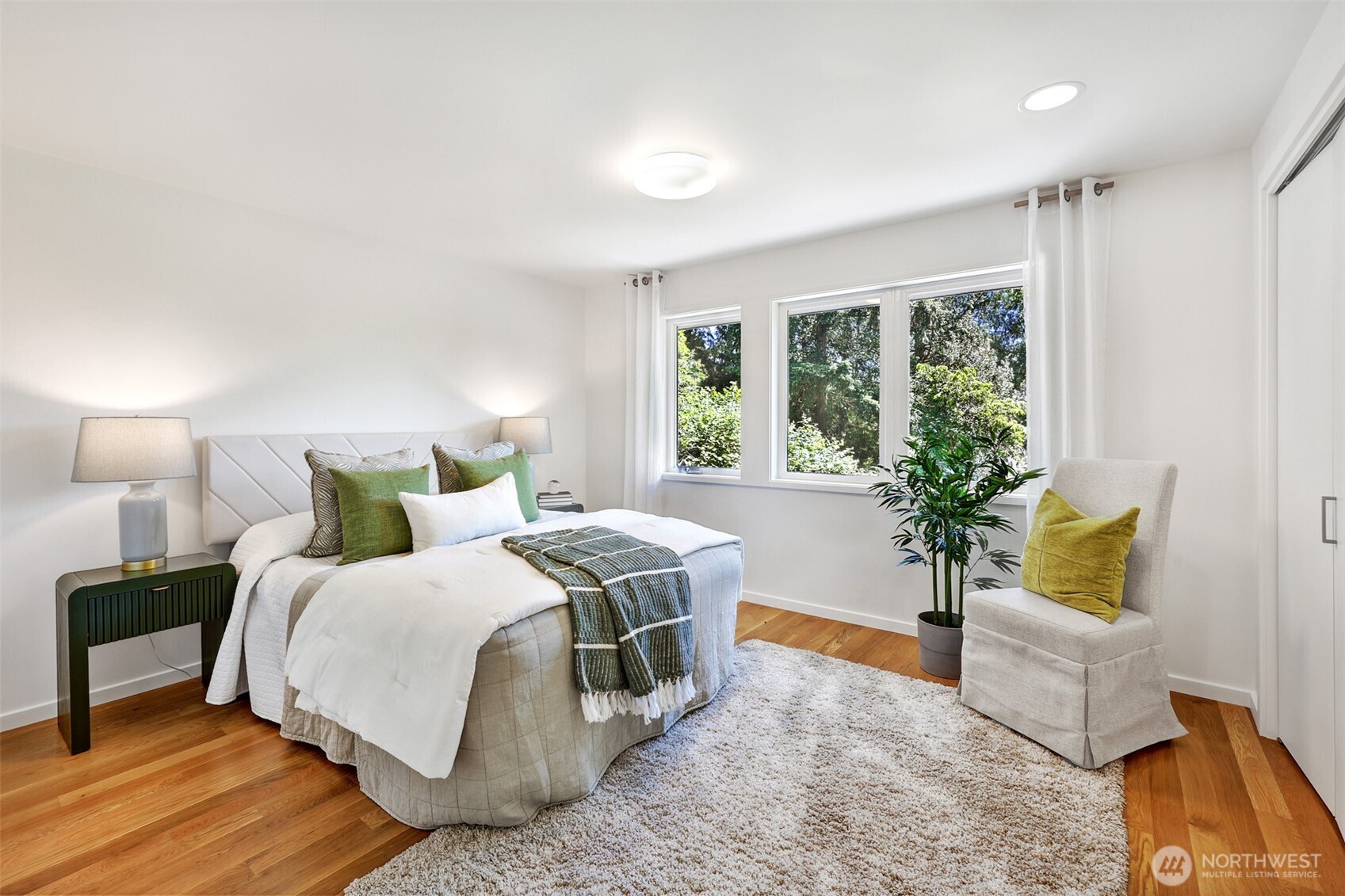 2547 Northeast 83rd Street Seattle, WA 98115 - Photo 21 of 38 a bedroom with a bed and a couch