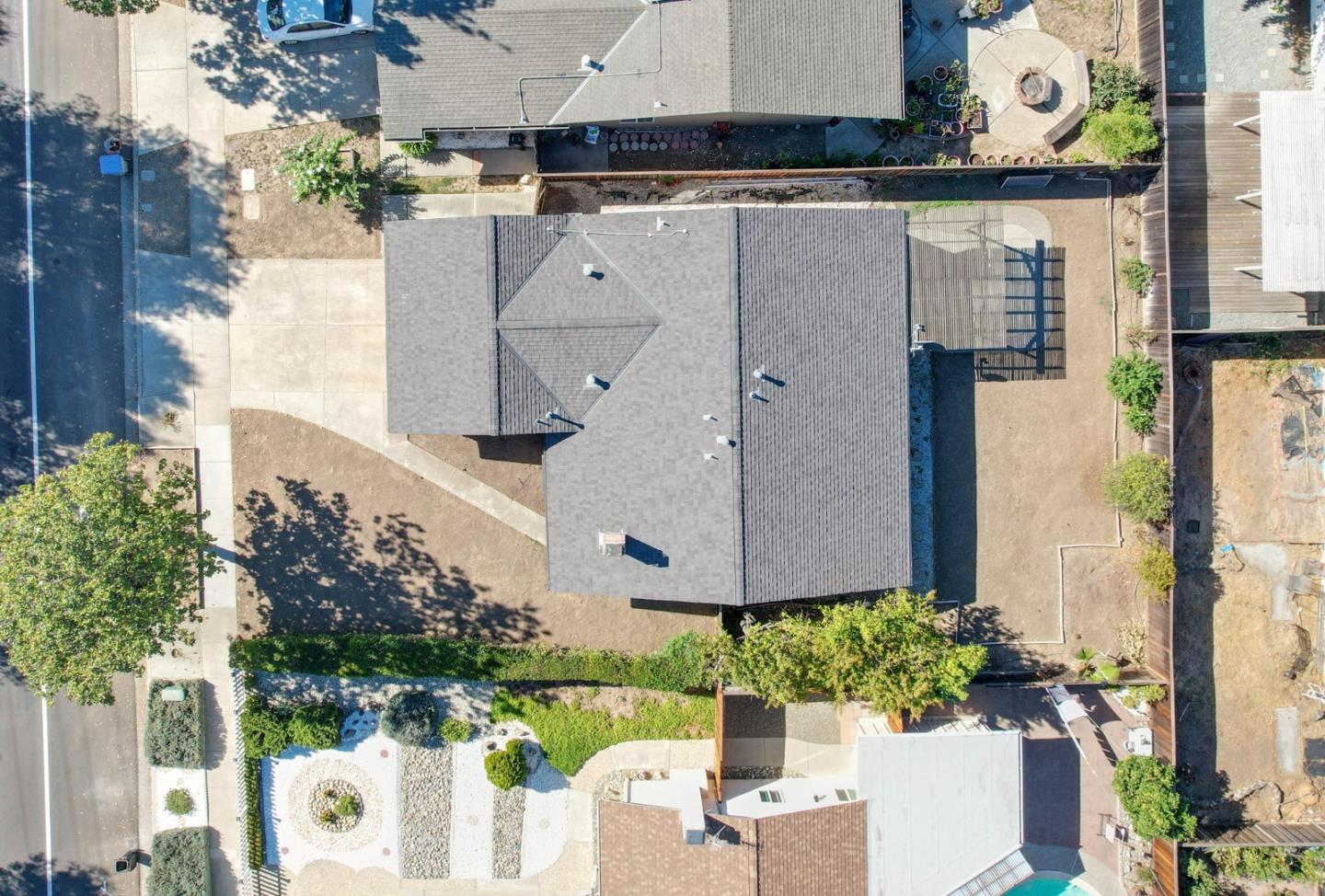 261 Bernal Road San Jose, CA 95119 - Photo 21 of 21 an aerial view of a house with a yard and large trees