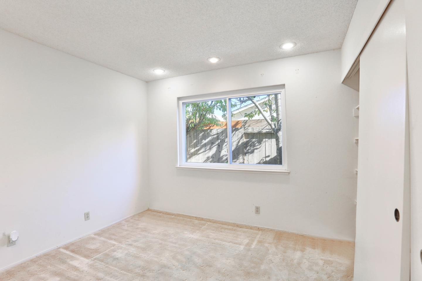 261 Bernal Road San Jose, CA 95119 - Photo 10 of 21 an empty room with windows