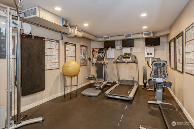 a view of an entryway with a wooden door