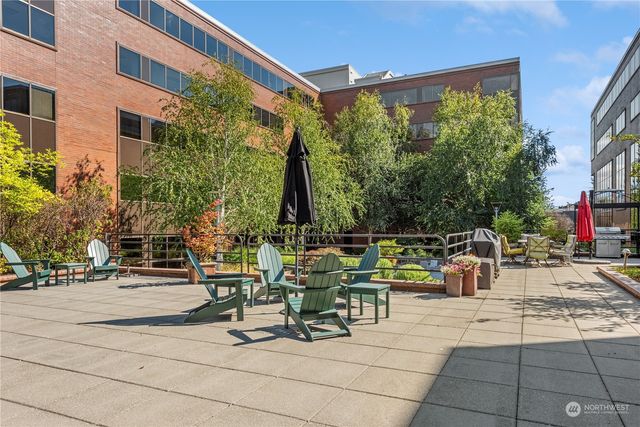 a view of parking garage with cars