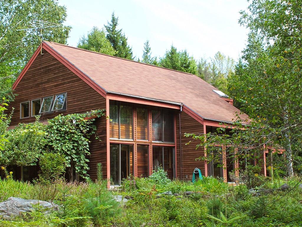 909 Oak Point Road Trenton, ME 04605 - Photo 1 of 30 Exterior showing vine over the patio...