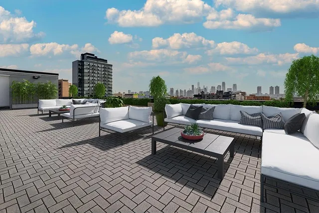 a living room with furniture a ceiling fan and a rug