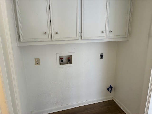 404 West Dittmar Road Austin, TX 78745 - Photo 6 of 15 Washroom featuring hookup for a washing machine, electric dryer hookup, dark wood-type flooring, and cabinet space