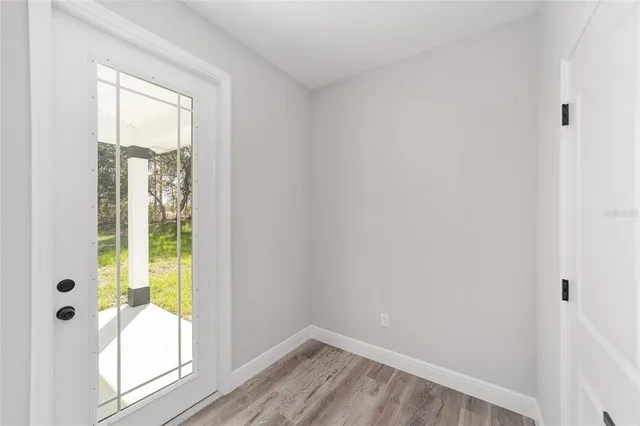 a bathroom with a tub and shower