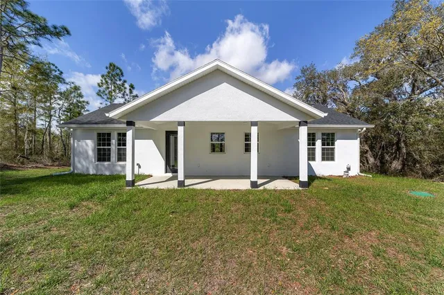 front view of a house and a yard