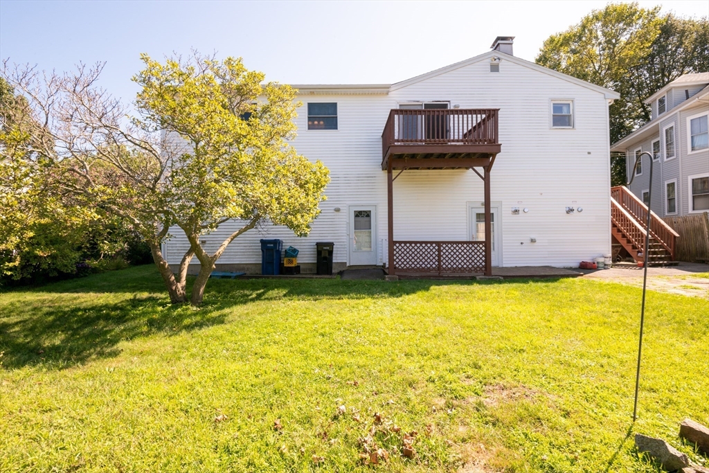 24 Webb Street Salem, MA 01970 - Photo 34 of 38 a view of a house with pool and a yard