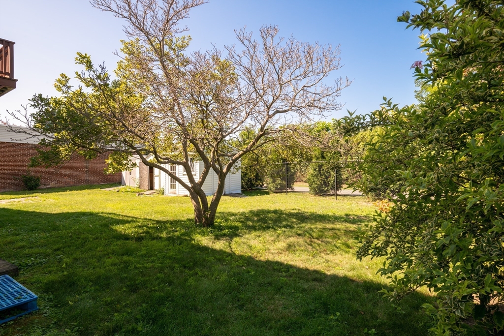 24 Webb Street Salem, MA 01970 - Photo 35 of 38 a view of an ocean with a yard