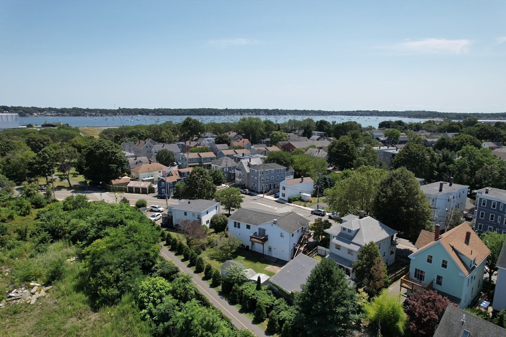 24 Webb Street Salem, MA 01970 - Photo 7 of 38 an aerial view of a city with lots of residential buildings