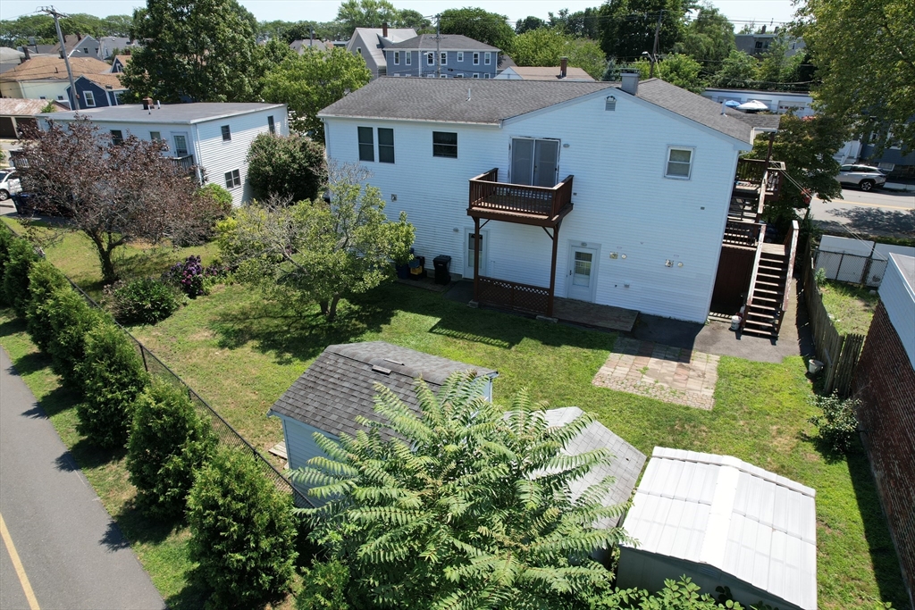 24 Webb Street Salem, MA 01970 - Photo 8 of 38 a front view of a house with a yard