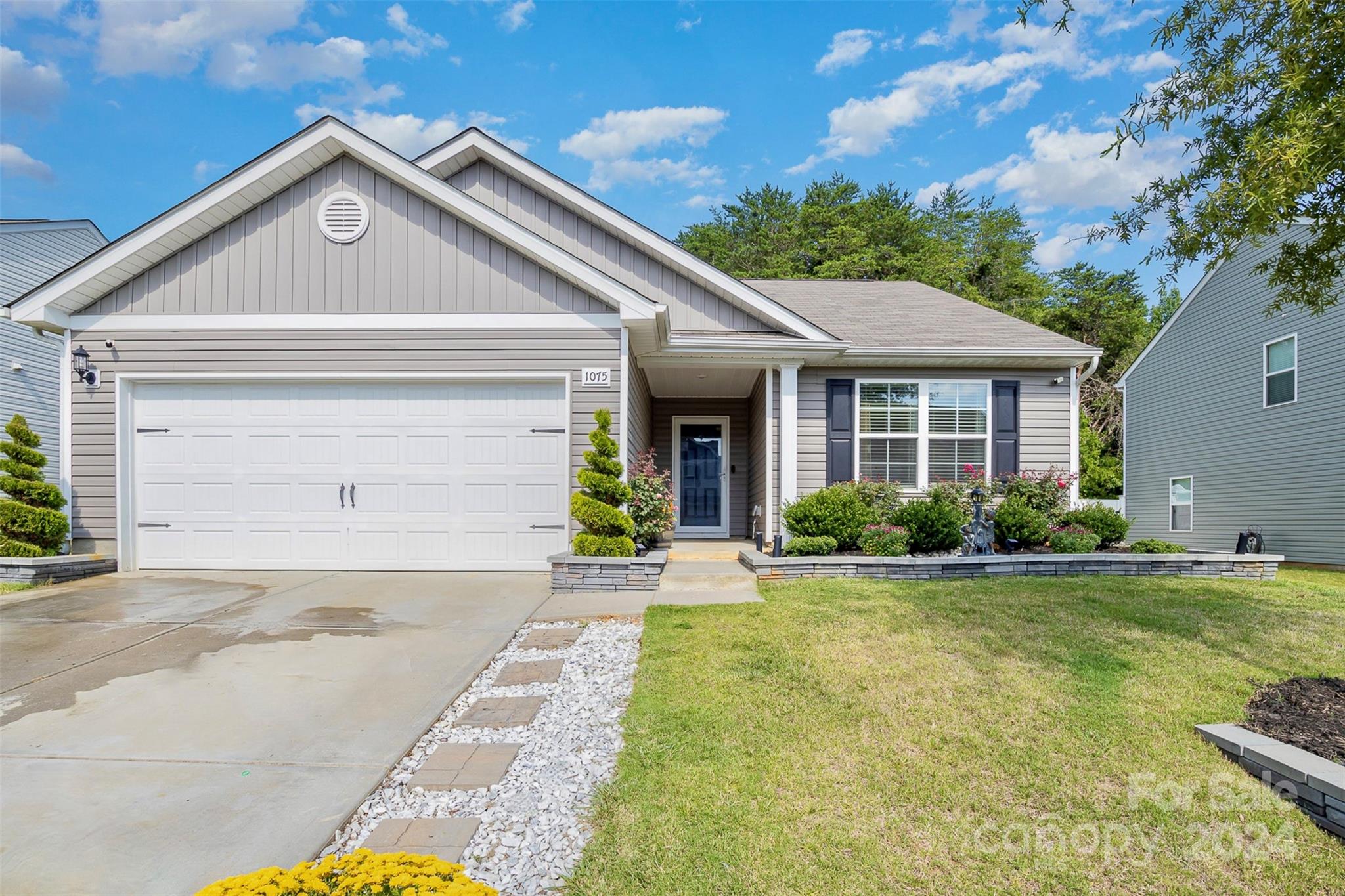 1075 Winding Creek Road Salisbury, NC 28146 - Photo 1 of 18 a front view of a house with a yard