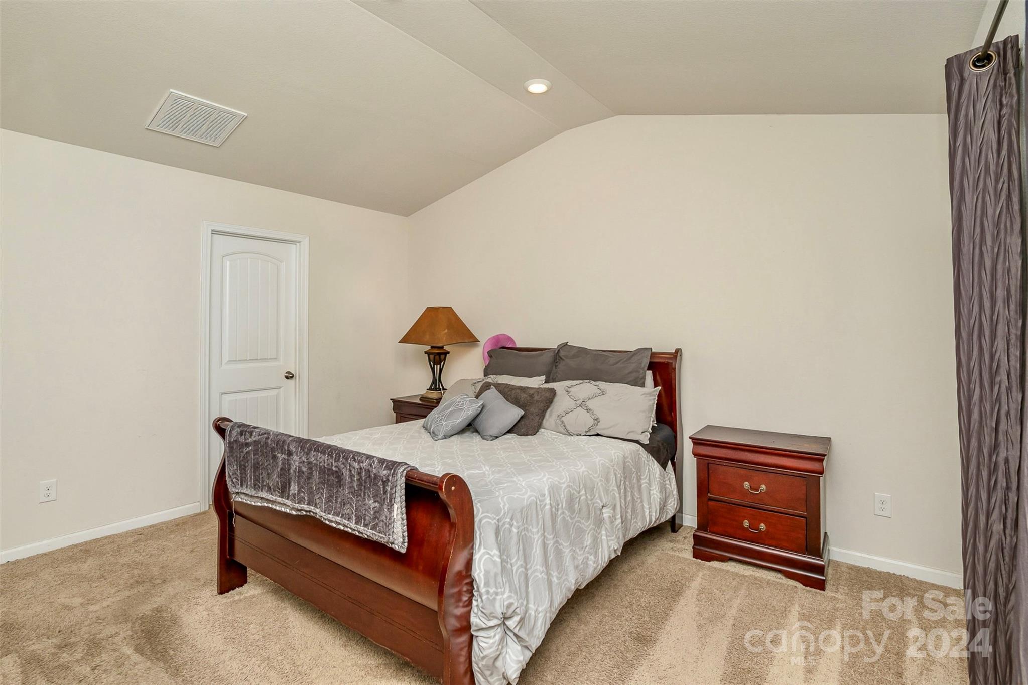 1075 Winding Creek Road Salisbury, NC 28146 - Photo 12 of 18 a bedroom with a bed and a dresser